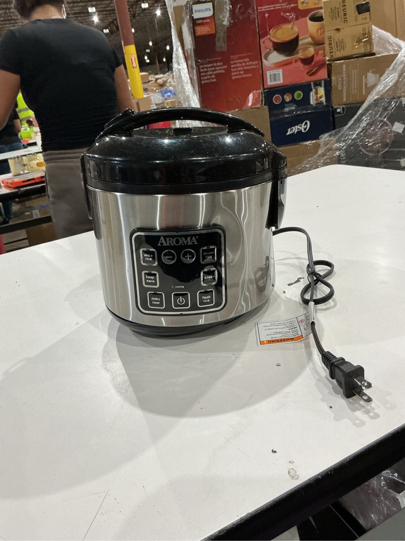 Condition photo showing As Is for aroma digital rice cooker, 4-cup (uncooked) / 8-cup (cooked), steamer, grain cooker, multicooker, 2 qt, stainless steel exterior, arc-914sbd 4 cup uncooked / 8 cup cooked