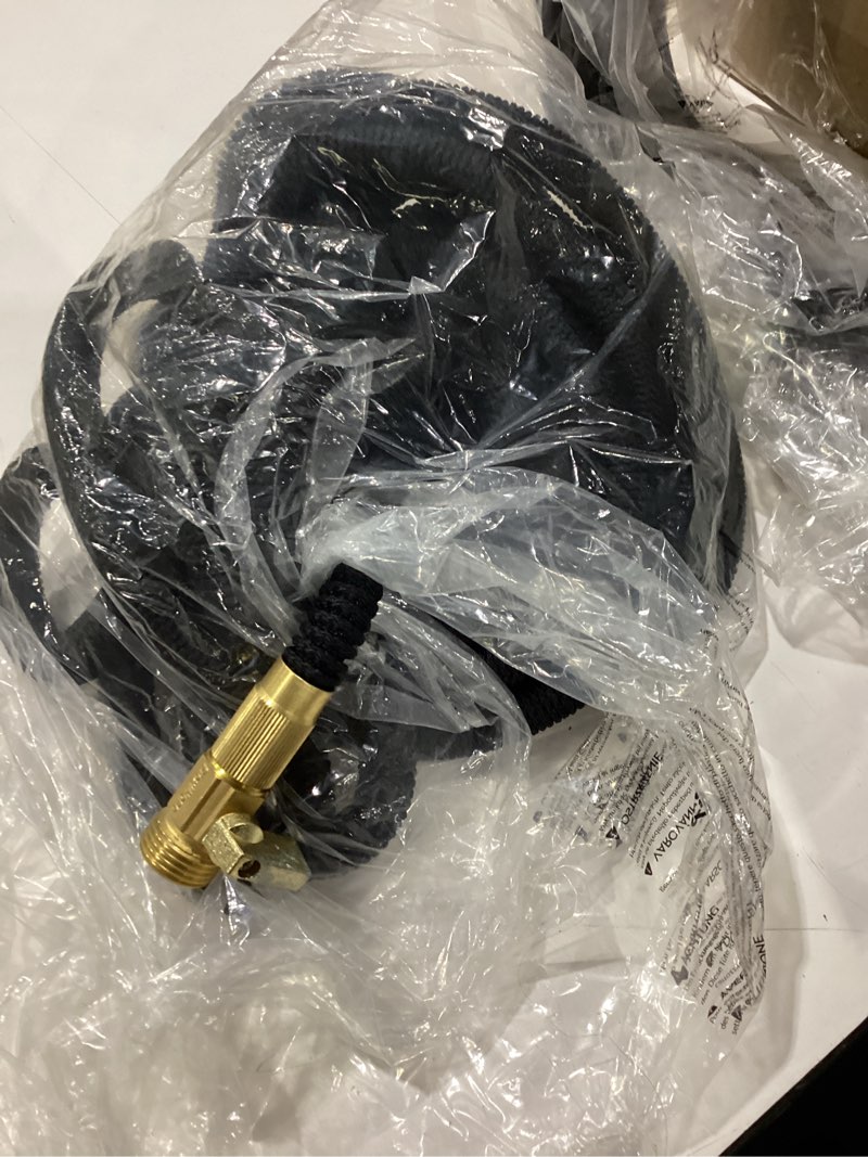 Condition photo showing New/Like New for flexi hose plus with 8 function nozzle expandable garden hose, lightweight & no-kink flexible garden hose, 3/4 inch solid brass fittings and double latex core, 75 ft black 75ft black