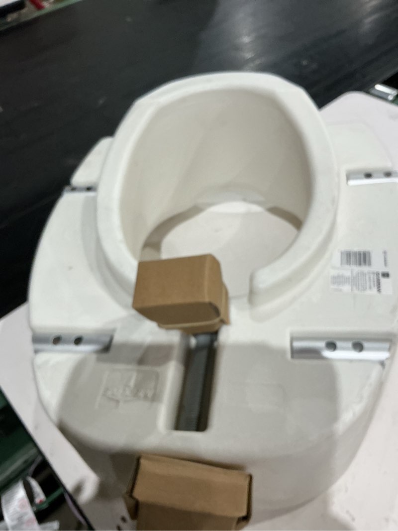 Condition photo showing As Is for medline 5  elongated raised toilet seat  with lock and removable padded arms
