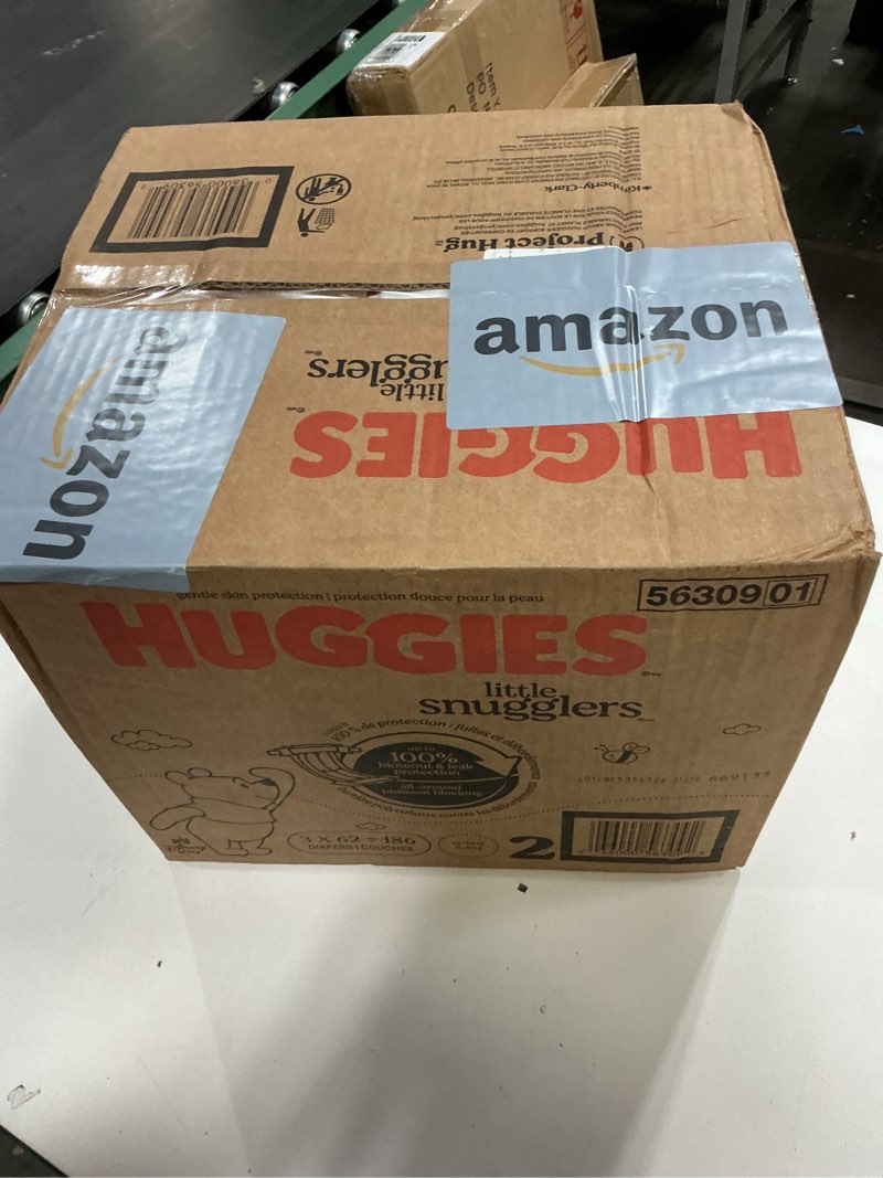 Condition photo showing New/Like New for Huggies Size 2 Diapers, Little Snugglers Baby Diapers, Size 2 (12-18 lbs), 186 Count (3 Packs of 62), Packaging May Vary