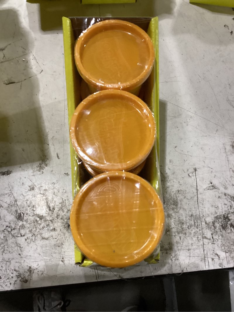 Condition photo showing New/Like New for 6 pack of playdoh (orange)