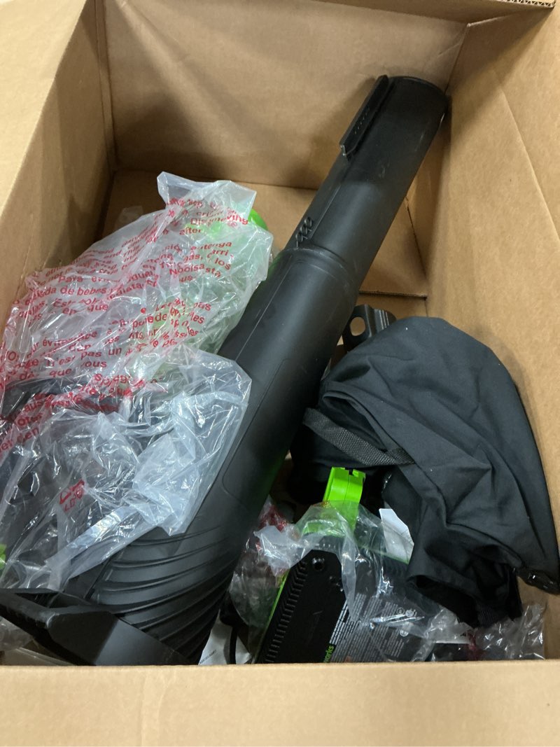 Condition photo showing As Is for greenworks 48v (24v x 2) cordless brushless leaf blower/vacuum (520 cfm / 240 mph) with bag, powerful & efficient for yard debris cleanup, includes (2) 4.0ah battery & dual port charger blower / vac (2 x 4.0ah)