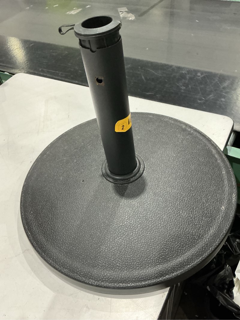 Condition photo showing As Is for patio umbrella base