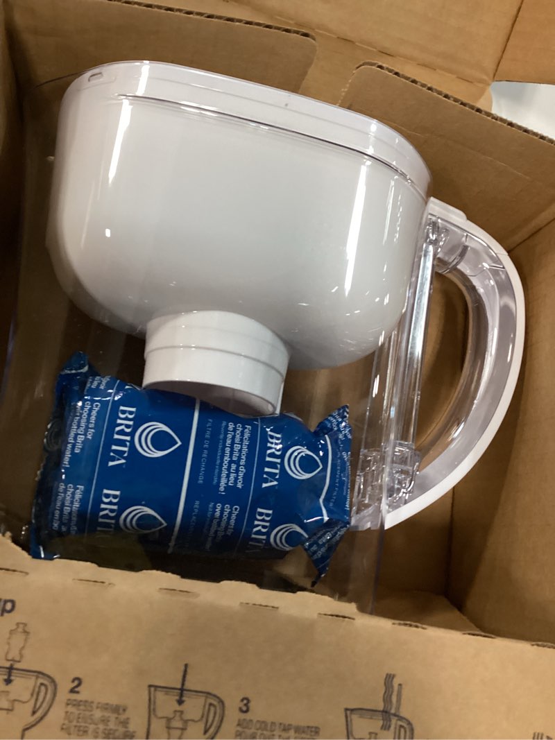 Condition photo showing New/Like New for brita water pitcher, metro elite filter, removes 99% of lead, includes 1 filter, 6-cup capacity, white elite filter white