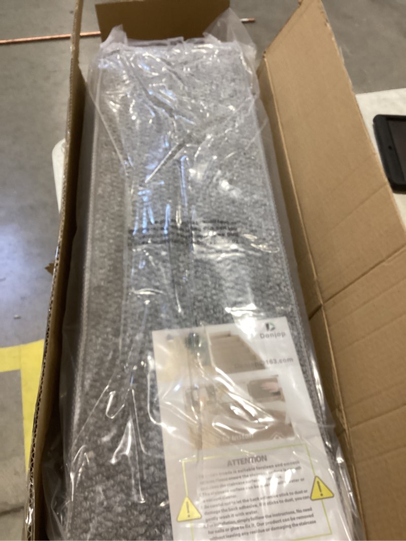 Condition photo showing Good Condition for stair treads for wooden steps indoor, 15 pack 8" x 30" non slip carpet stair treads with reusable adhesive for kids elders and dogs, surface polyester tpr backing stair runner rugs, dark grey 8" x 30" dark grey 15