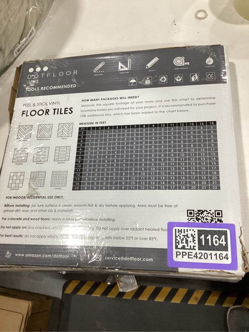 Condition photo showing New/Like New for peel and stick vinyl floor tiles