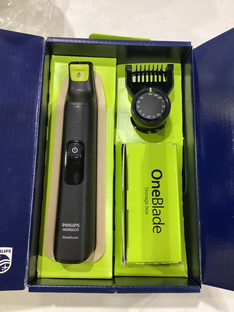 Condition photo showing New/Like New for philips norelco oneblade pro 360 face + body electric shaver, beard trimmer and groomer, with 360 blade technology, 14-length precision comb, body kit, soft pouch, model qp6542/70 oneblade pro 360 face+body - 5 piece set black/lime green