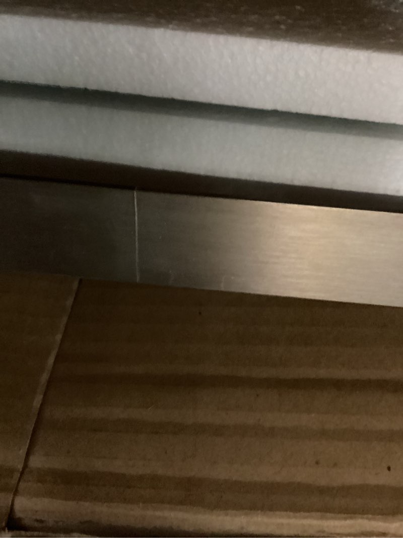 Condition photo showing Good Condition for loaao 24x36 inch brushed nickel bathroom mirror, rounded rectangle silver metal frame mirror, brushed nickel, anti-rust, hangs horizontally or vertically brushed nickel 24"l x 36"w