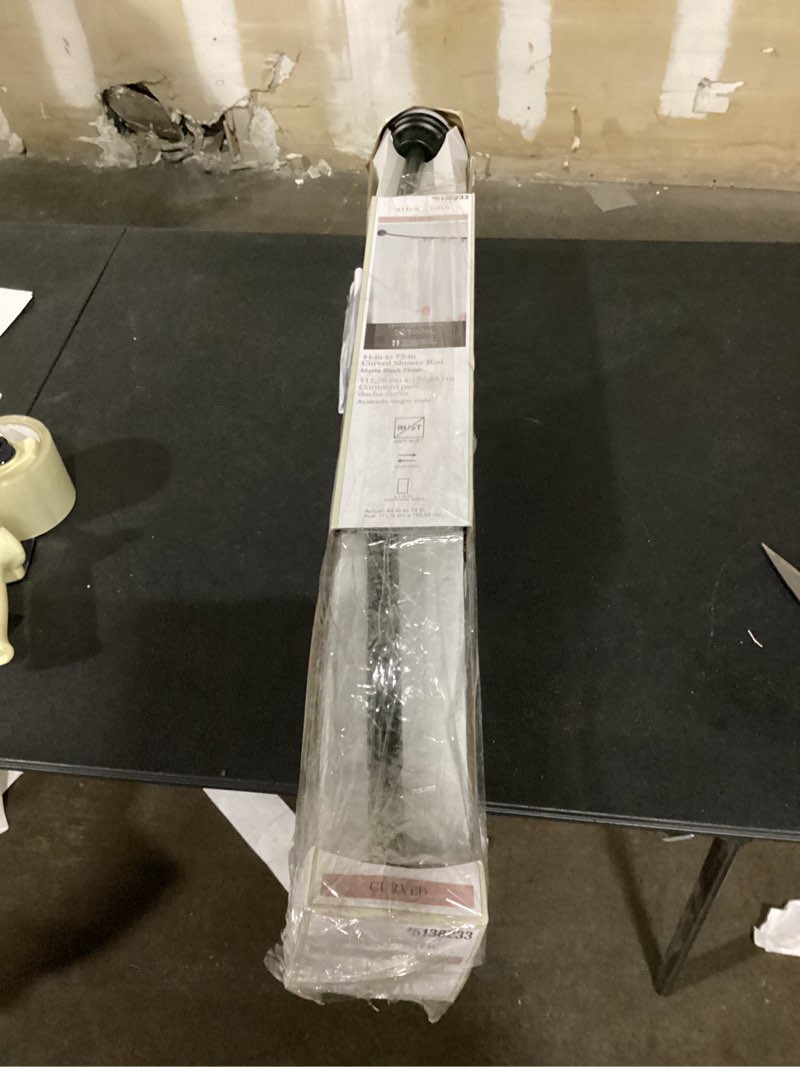 Condition photo showing As Is for allen + roth 44-in to 72-in matte black fixed or tension single curve adjustable shower curtain rod