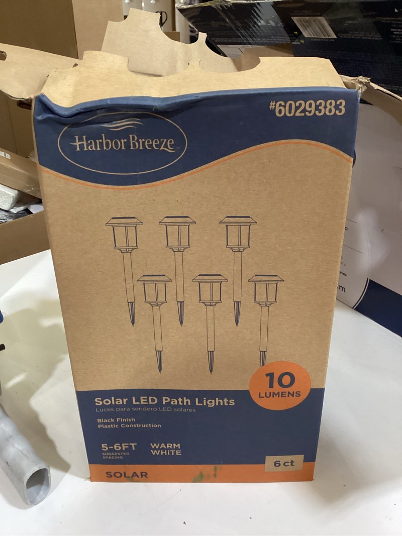 Condition photo showing As Is for harbor breeze 6 -pack 10 -lumens matte black solar led outdoor path light kit ( 3000-k )