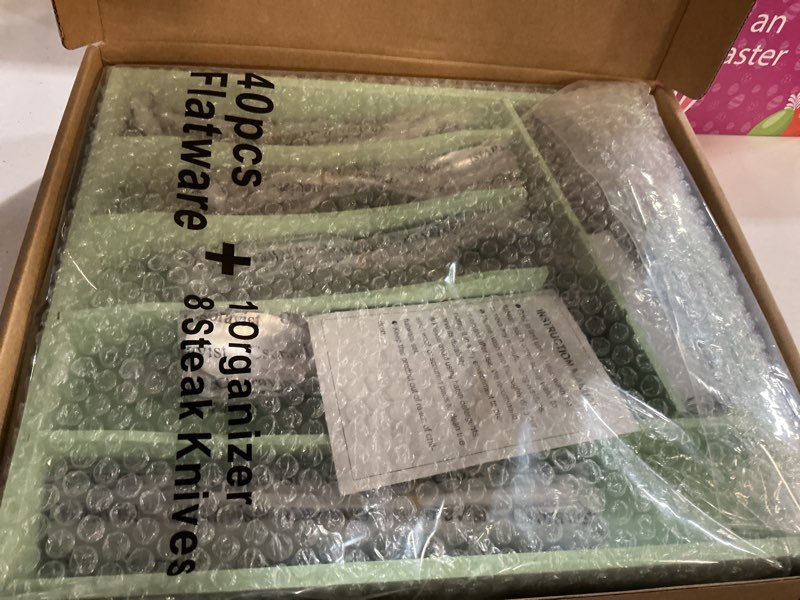 Condition photo showing New/Like New for 49-piece silverware set with bamboo organizer for 8, heavy-duty stainless steel flatware set with steak knives, rust-proof & mirror polished, dishwasher safe(organizer is only for packaging) heavy duty