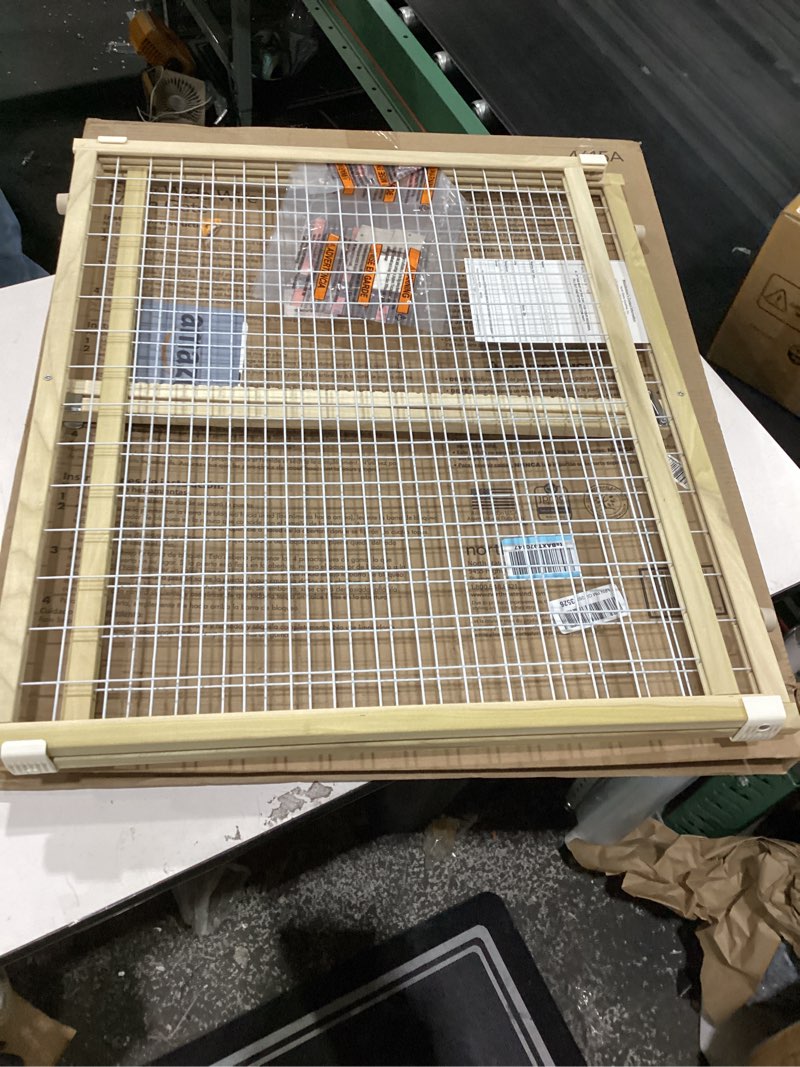 Condition photo showing New/Like New for wide wire mesh pet gate-color:white