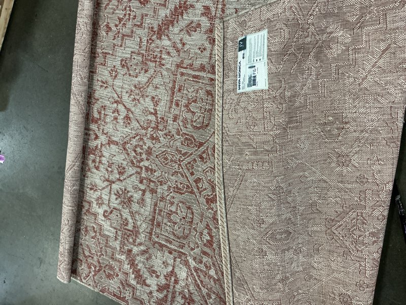 Condition photo showing As Is for 5’-3”x6’-6” jonathan y santa monica estrella textured weave loomed polypropylene red/taupe rectangular indoor/outdoor border coastal area rug
