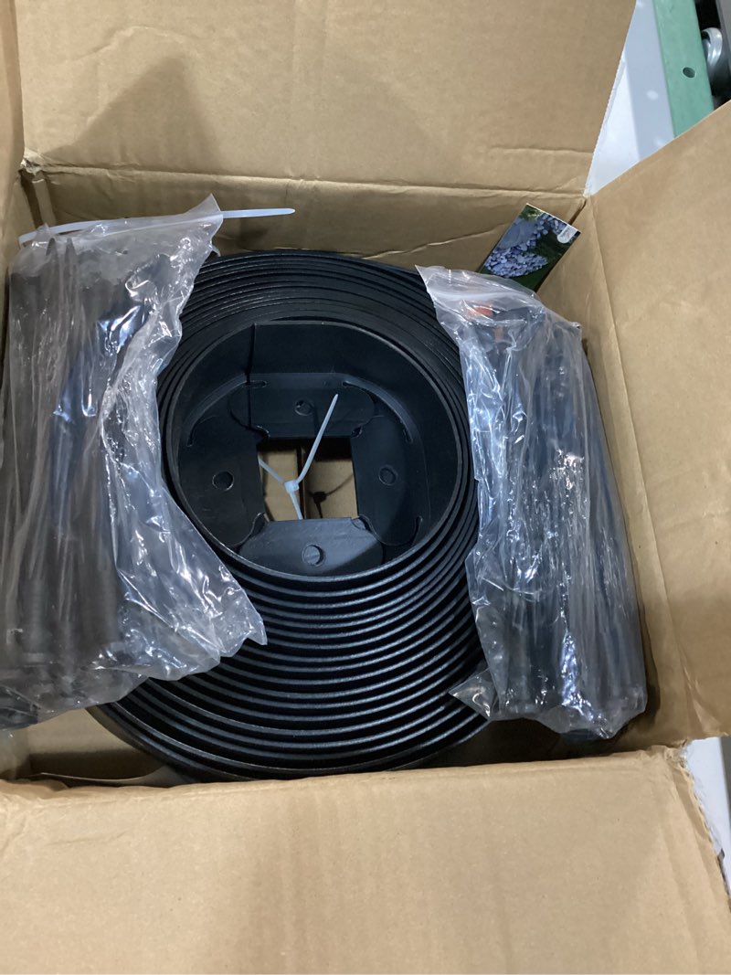 Condition photo showing Good Condition for anleolife 40ft no-dig garden landscape edging with 48 spikes, 2in black | 2-inch tall flexible lawn edging, easy install—stake into soil. uv-stabilized hdpe. neat borders for paths & walkways black 40ft+48pcs anchoring spikes