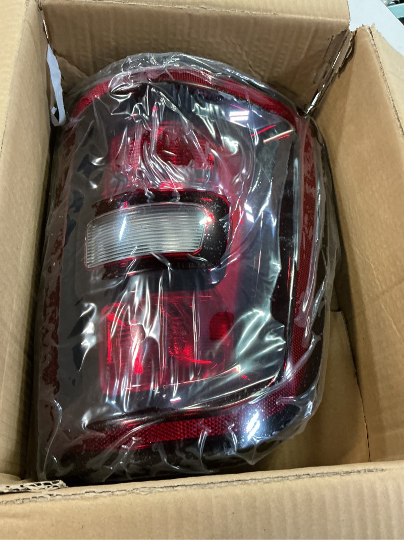 Condition photo showing New/Like New for dasbecan halogen tail light assembly compatible with 2025 2026 dodge ram 1500 taillight smoked black bezel rear lamp left driver side replace#68531047aa black bezel left driver side