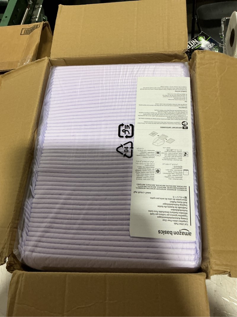 Condition photo showing New/Like New for amazon basics cat pee pads, super absorbent, odor control with fresh scent, universal fit for litter box, multi cat, disposable, white/purple, 100 count fresh 100 count
