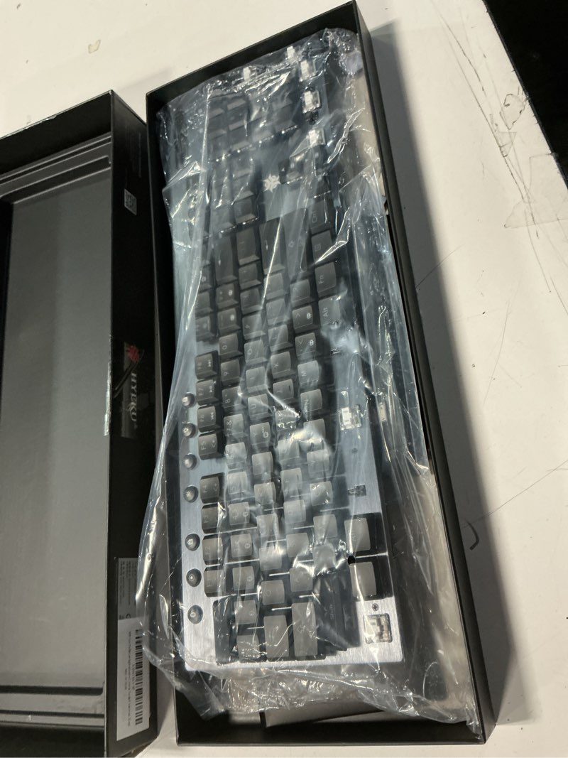Condition photo showing As Is for Hexgears Low Profile Gaming Keyboard w/Ultra-Thin Design, 2-Mode Wireless RGB Mechanical Keyboard, Dedicated Media Control & Tactile White Switch (Gray) Gray & Clicky