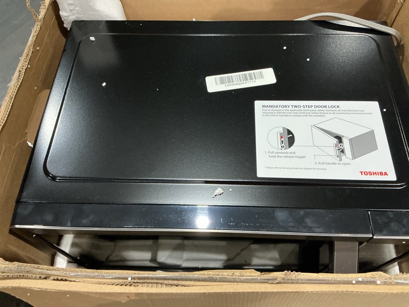 Condition photo showing As Is for toshiba ml-em09pa(bs) small microwave oven with 6 auto menus, mute function & child lock, led lighting, 0.9 cu ft, 10.6 inch removable turntable, 900w, countertop, black stainless steel advanced-0.9 cu ft-900w-black stainless steel