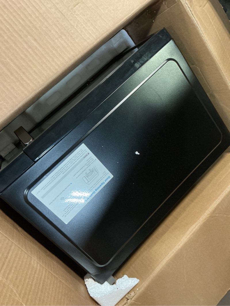 Condition photo showing Good Condition for farberware 1.1 cu. ft. countertop microwave oven – 1000 watts power, auto cook settings, defrost, easy clean and child safety lock - stainless 1.1 cu. ft. stainless steel