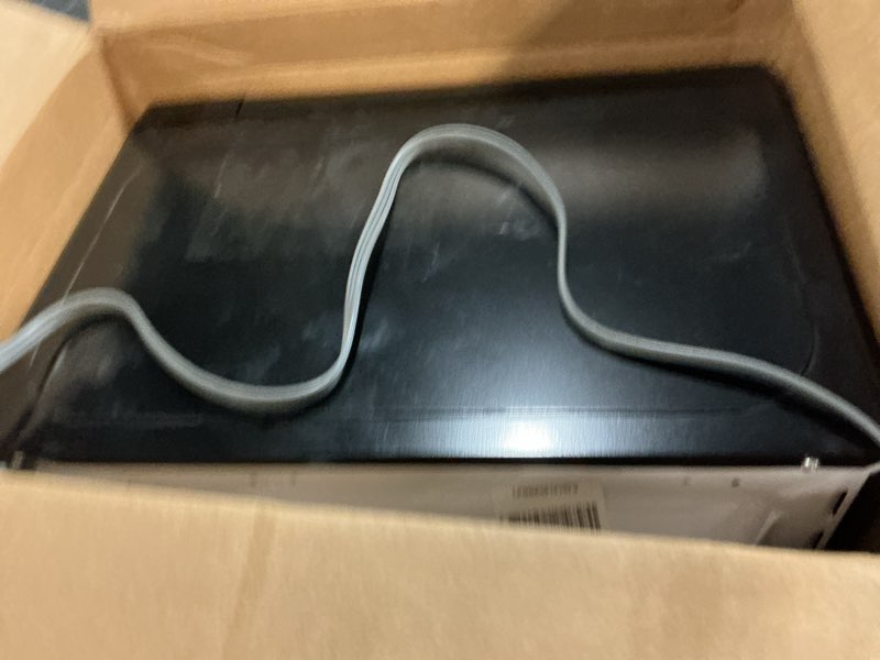 Condition photo showing As Is for BLACK+DECKER EM720CB7 Digital Microwave Oven with Turntable Push-Button Door, Child Safety Lock, 700W, Stainless Steel, 0.7 Cu.ft 0.7 cu. ft.