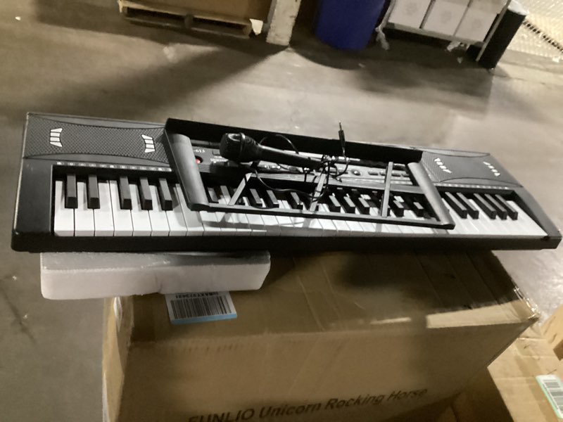 Condition photo showing New/Like New for 61 Keys Electronic Digital piano, Portable Keyboard Piano with Built-in Speaker and Microphone, Sheet Stand and Power Supply, Keyboard Piano Teaching Gift for Beginners Eelectric