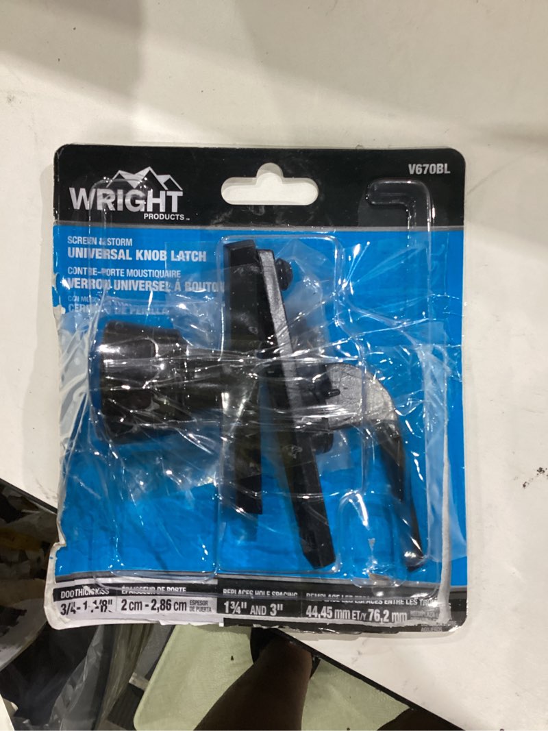 Condition photo showing As Is for universal knob door latch for screen and storm doors, black