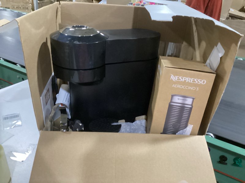 Condition photo showing New/Like New for nespresso vertuo next premium coffee and espresso maker by breville with aeroccino milk frother black machine + milk frother