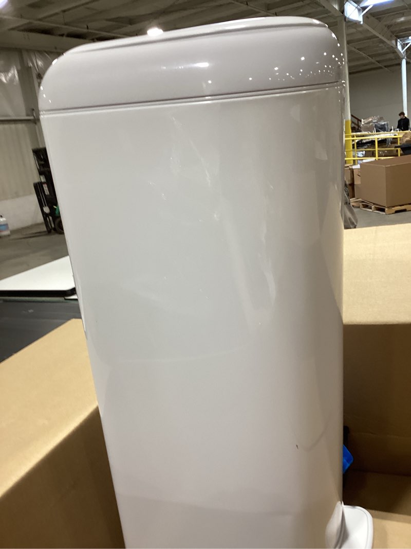 Condition photo showing Good Condition for diaper genie platinum pail (lily white) is made in durable stainless steel and includes 1 easy roll refill with 18 bags that can last up to 5 months.