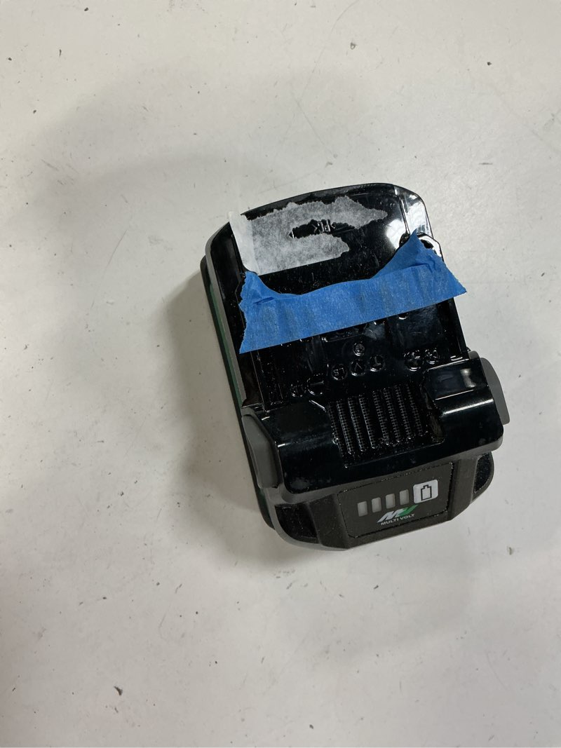 Condition photo showing As Is for metabo hpt multivolt 18 volt/36 volt 5.0ah/2.5ah lithium ion battery with fuel indicator