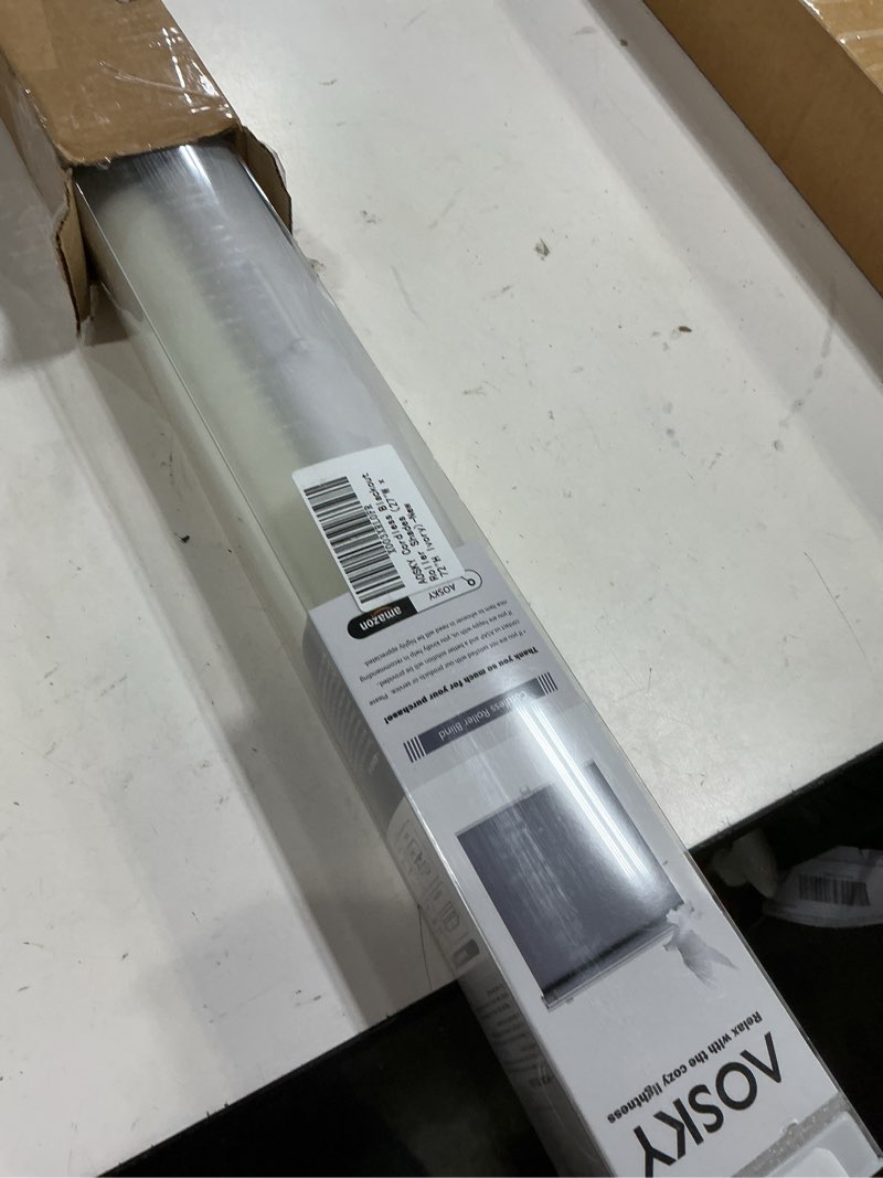 Condition photo showing New/Like New for aosky cordless roller shades blackout blinds for windows room darkening rolled up shades with spring system, uv protection window shades door blinds for home and office (27" w x 72" h, ivory) 27"w x 72"h ivory