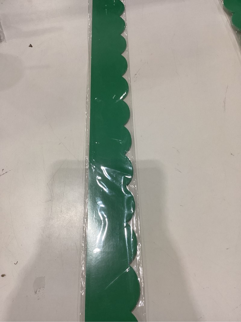 Condition photo showing Good Condition for carson dellosa grow together 39ft of jade green bulletin board borders, 13 strips of scalloped trim for rolling whiteboard, posterboard, st patricks day, christmas decorations, and classroom decor