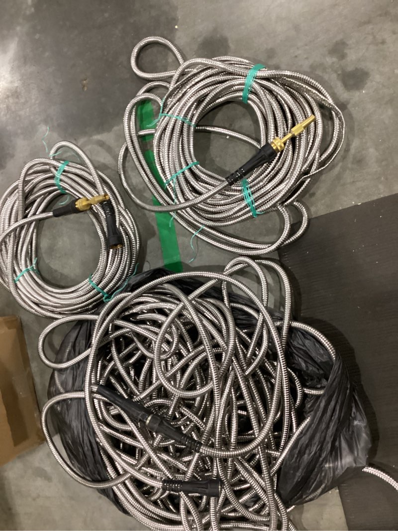 Condition photo showing As Is for (length unknown) stainless steel heavy duty garden hose (3 pack)