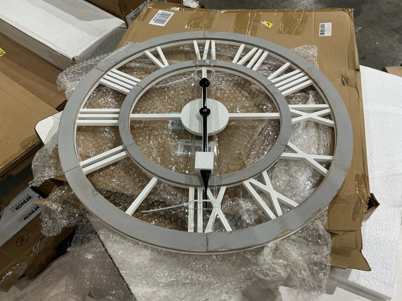 Condition photo showing Good Condition for concept in time decorative wall clock 24" round oversized roman numeral modern wood style home decor (grey wood)