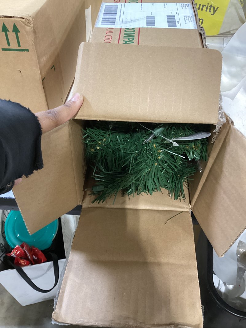 Condition photo showing Good Condition for national tree company 24 in pre-lit majestic fir mini artificial christmas tree, 35 clear lights, 71 tips, red cloth base, green plug in w/red bag tree