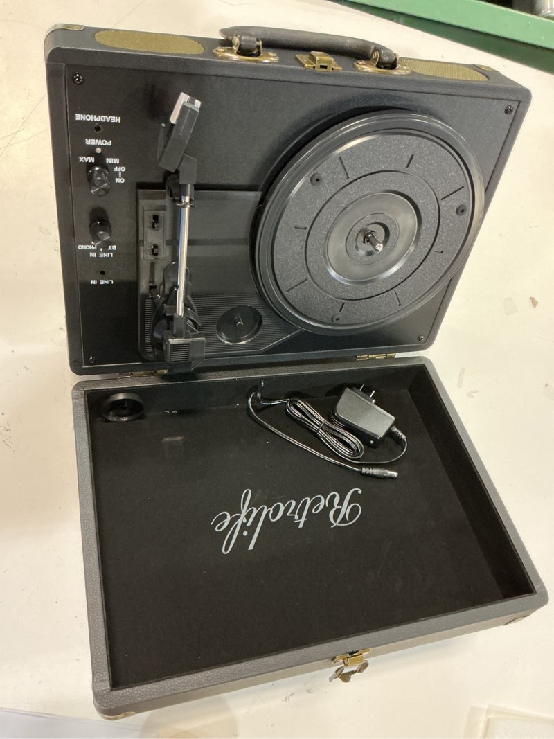 Condition photo showing Good Condition for vinyl record player 3-speed bluetooth suitcase portable belt-driven record player with built-in speakers rca line out aux in headphone jack vintage turntable black