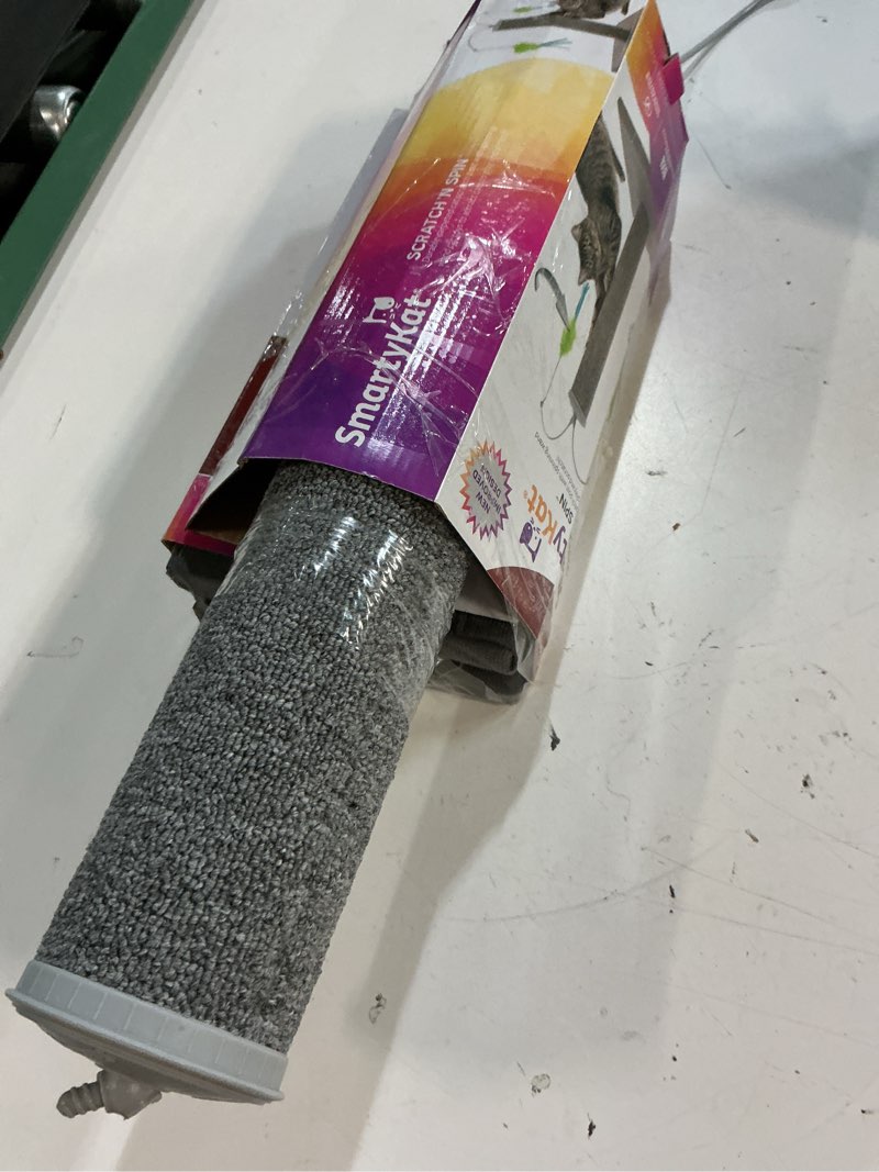 Condition photo showing Good Condition for smartykat scratch 'n spin carpet with 2 wand cat toys