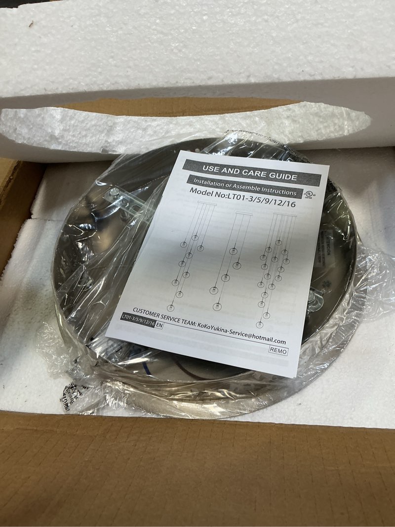 Condition photo showing Good Condition for KoKo&Yukina 3-Light Globe Glass Pendant Light Modern Nickel Clear Globe Glass Chandelier Adjustable 