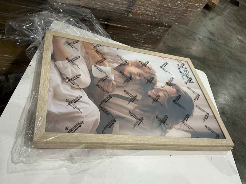 Condition photo showing Good Condition for 16x24 picture frame set of 3, natural wood grain 16x24 frames for horizontal and vertical wall mounting (3 pack,natural) 16x24, 3 pack natural