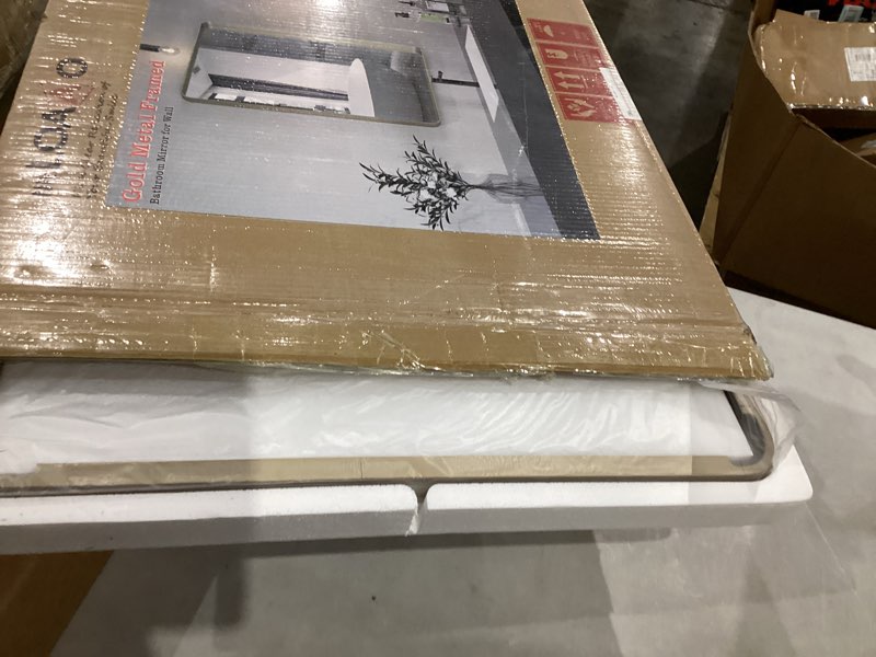 Condition photo showing Good Condition for loaao 22”x30” gold bathroom mirror, rounded rectangle gold frame mirror, brushed gold bathroom vanity mirror wall-mounted, anti-rust, hangs horizontally or vertically gold 22"l x 30"w