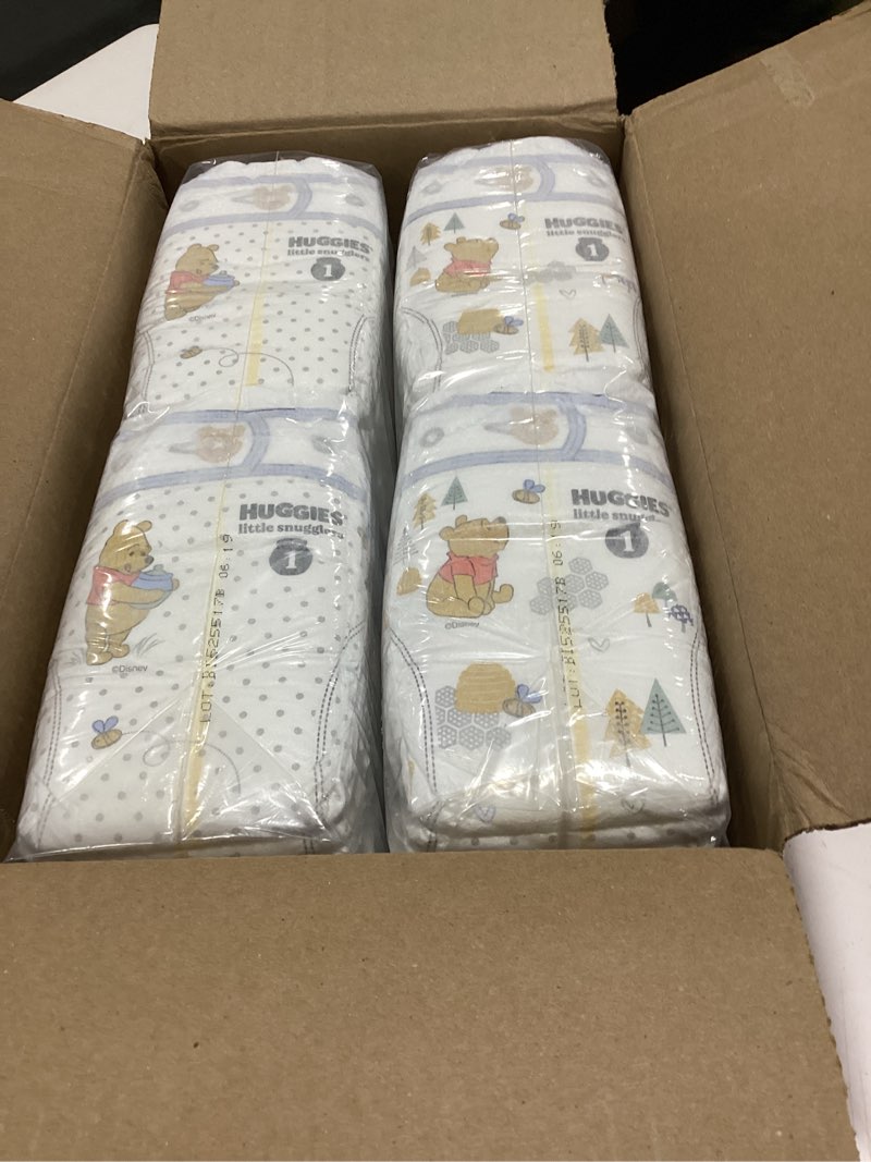 Condition photo showing Good Condition for Huggies Size 1 Diapers, Little Snugglers Baby Diapers, Size 1 (8-14 lbs), 96 Count, Packaging May Vary Size 1 96