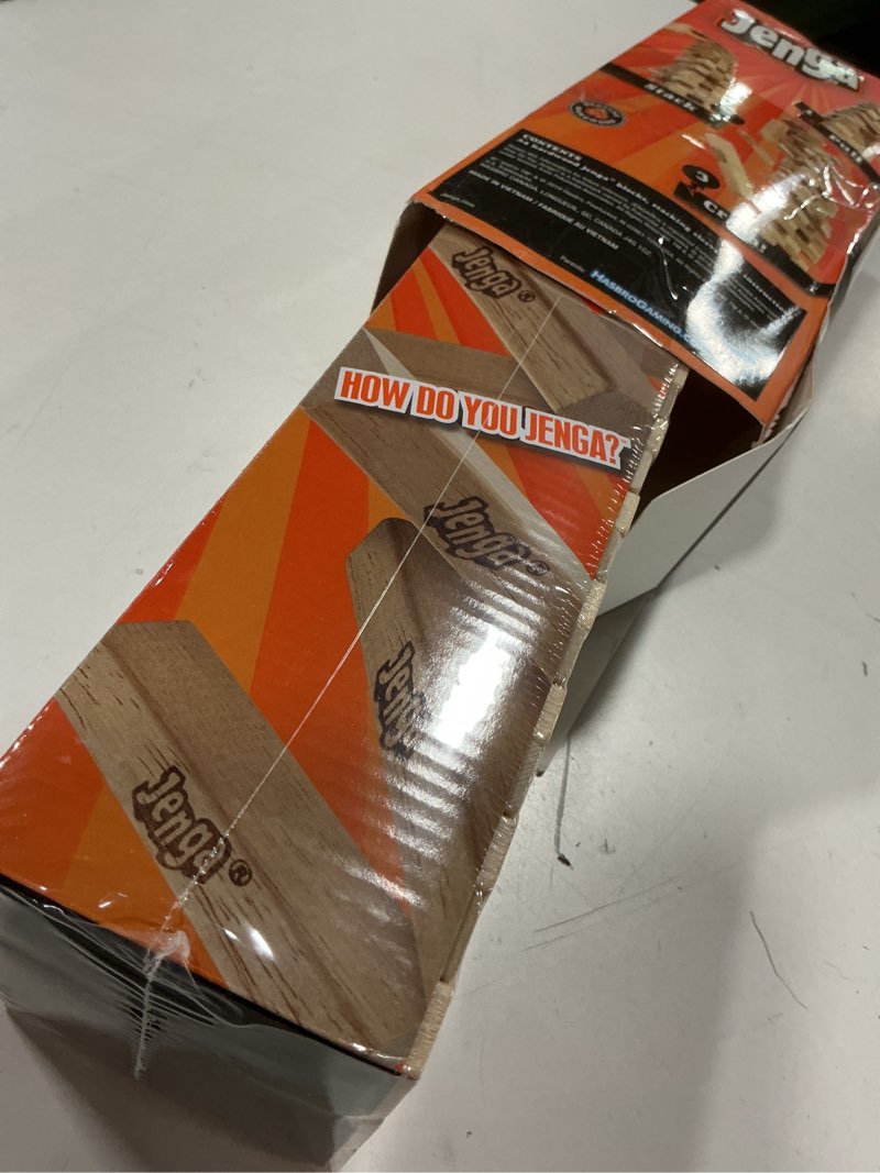 Condition photo showing New/Like New for Hasbro Gaming Jenga Game | The Original Wood Block Game with Genuine Hardwood Blocks | Stacking Tower | Ages 6+ | 1 or More Players | Party Games for Kids | Family Games Classic