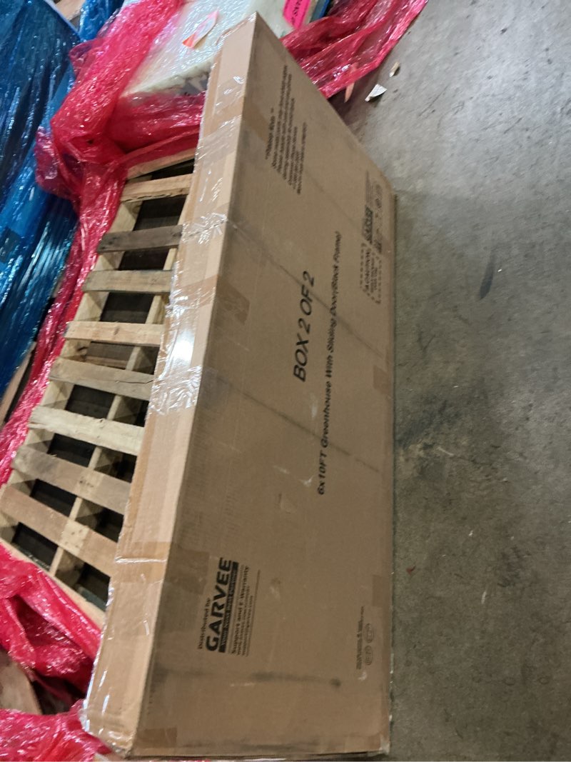 Condition photo showing As Is for Garvee 10x6 ft greenhouse with sliding door (incomplete box 2/2)