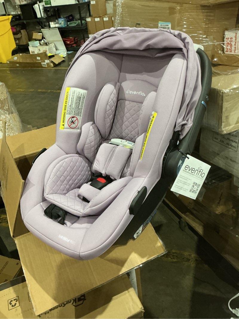 Condition photo showing Good Condition for evenflo litemax nxt rear-facing lightweight preemie and infant car seat 3-30lbs with sensorysoothe. easy install with base (agate)