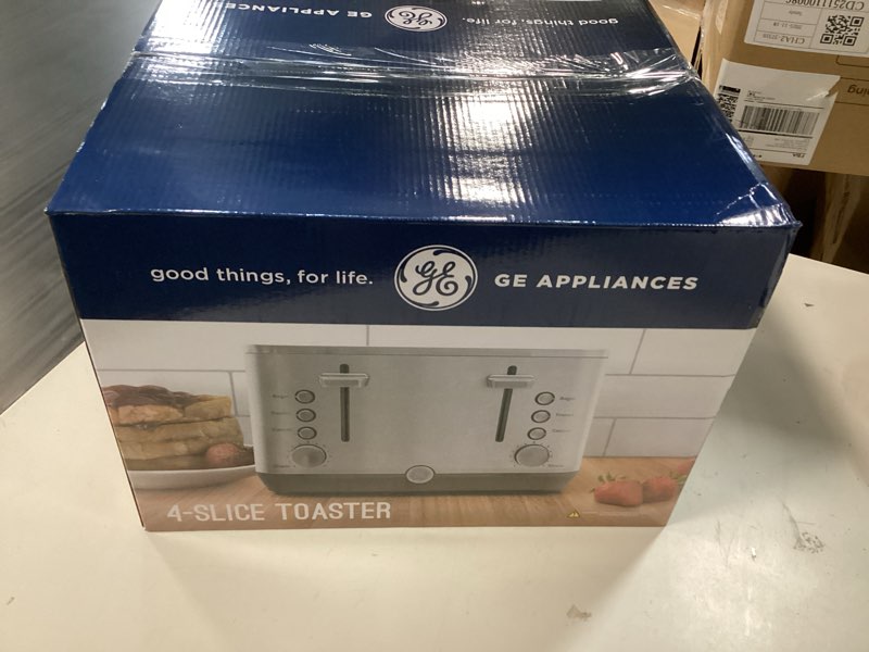 Condition photo showing New/Like New for ge stainless steel 4 slice toaster | extra wide slots for bagels, breads, waffles & more | 7 shade options | countertop kitchen essentials | 1500 watt 4-slice stainless steel