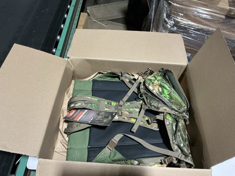 Condition photo showing Good Condition for alps outdoorz impact camo turkey vest with removable flip down seat, game bag and plenty of pockets for calls and strikers mossy oak obsession standard