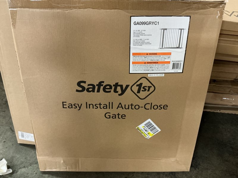 Condition photo showing New/Like New for easy install auto close 28 in. h child safety gate in grey