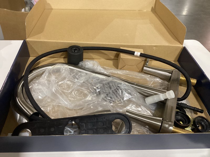 Condition photo showing As Is for project source stainless steel double handle deck-mount pull-out kitchen faucet with sprayer
