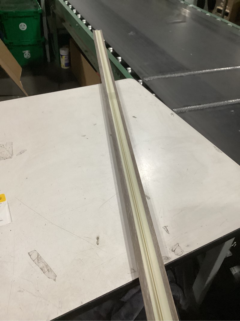 Condition photo showing As Is for project source privet 1/4-in t x 2-in w x 78.7-in l prefinished vinyl multi-purpose floor moulding