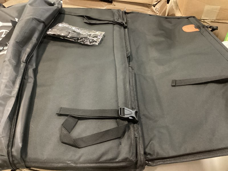 Condition photo showing Good Condition for large dog car seat for medium sized dog or 2 small dogs. waterproof, mesh sides with supporting rods, dual seat belt, enclosed, foldable & hard bottom pet car seat. pet travel bed 29.5"x19.7"x19.7"