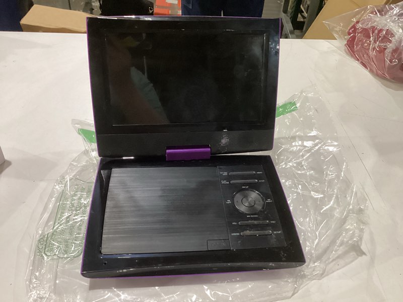 Condition photo showing As Is for used similar to stock photosyoton 12.5\\\" portable dvd player with 10.5\\\" hd swivel screen, easy setup for kids & elderly, 6-hour battery life, includes av cable & car charger, supports usb/sd card(not support blu-ray), purple